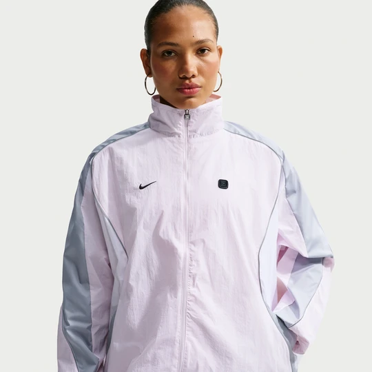 Zdjęcie produktu Damska kurtka z tkaniny Nike - Różowy