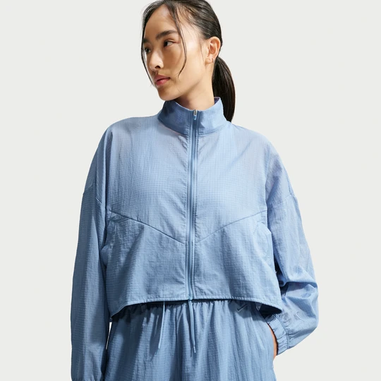 Zdjęcie produktu Damska lekka kurtka z materiału rip-stop o kroju oversize Nike - Niebieski