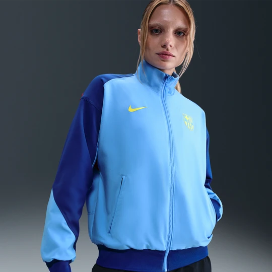 Zdjęcie produktu Damska piłkarska kurtka przedmeczowa Nike Dri-FIT FC Barcelona Strike (wersja czwarta) - Niebieski