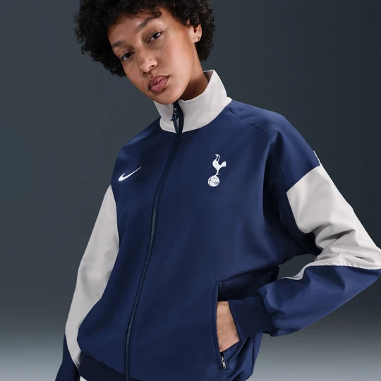 Zdjęcie produktu Damska piłkarska kurtka przedmeczowa Nike Dri-FIT Tottenham Hotspur Strike (wersja domowa) - Niebieski
