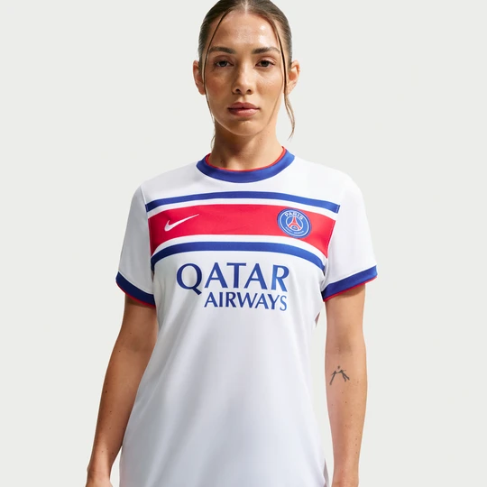 Zdjęcie produktu Damska przedmeczowa koszulka piłkarska Nike Dri-FIT Paris Saint-Germain (wersja domowa) - Biel