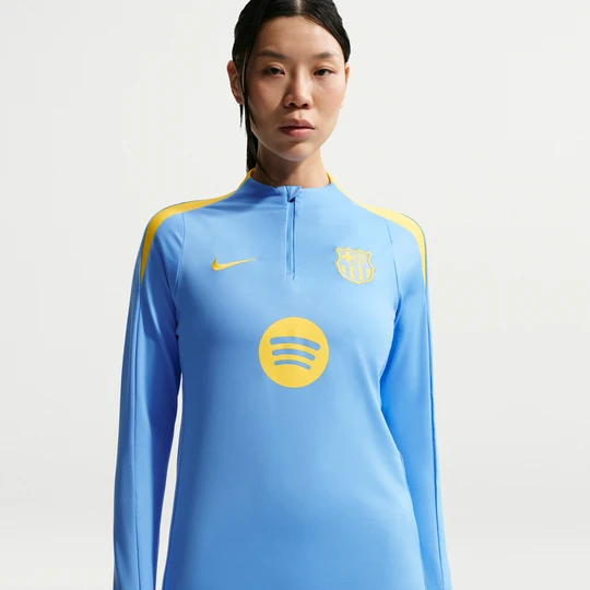 Zdjęcie produktu Damska treningowa koszulka piłkarska z dzianiny Nike Dri-FIT FC Barcelona Strike (wersja czwarta) - Niebieski