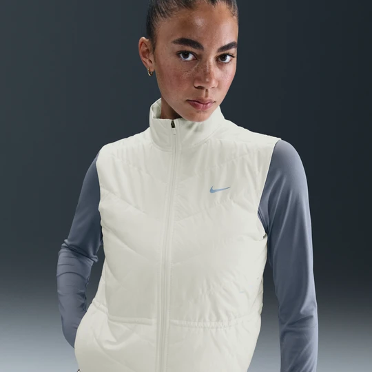 Zdjęcie produktu Damski bezrękawnik do biegania Therma-FIT Nike Swift - Biel