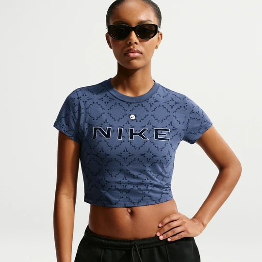 Zdjęcie produktu Damski dopasowany T-shirt o skróconym kroju Nike Chill Knit - Niebieski