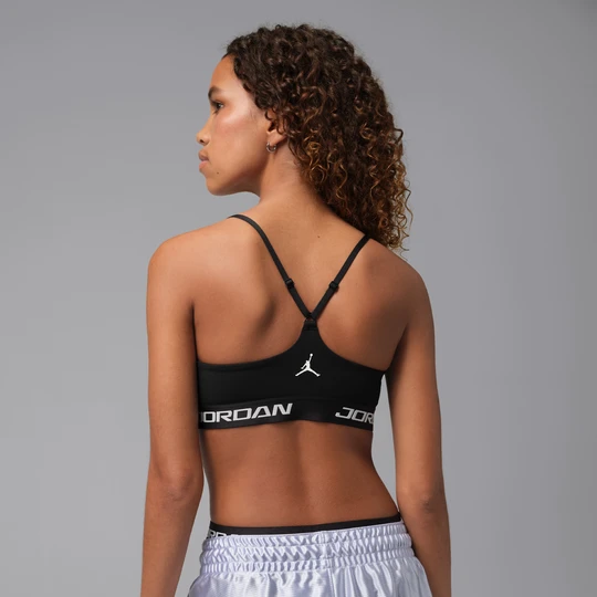 Zdjęcie produktu Damski regulowany stanik sportowy z wkładkami Jordan Sport Essentials - Czerń