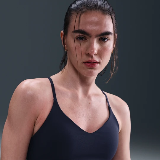 Zdjęcie produktu Damski regulowany stanik sportowy z wkładkami Nike Indy Light Support - Niebieski
