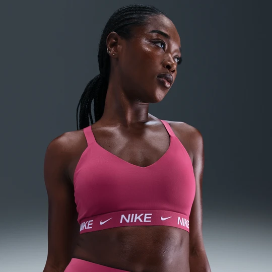 Zdjęcie produktu Damski regulowany stanik sportowy z wkładkami Nike Indy Medium Support - Fiolet