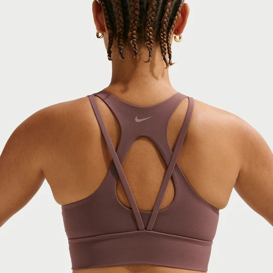 Zdjęcie produktu Damski stanik sportowy o wydłużonym kroju z wkładkami zapewniający lekkie wsparcie Nike Zenvy - Fiolet