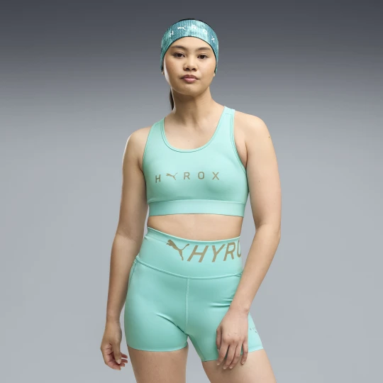 Zdjęcie produktu Damski stanik sportowy PUMA Ã— HYROX Mid, OdzieÅ¼, Zielony
