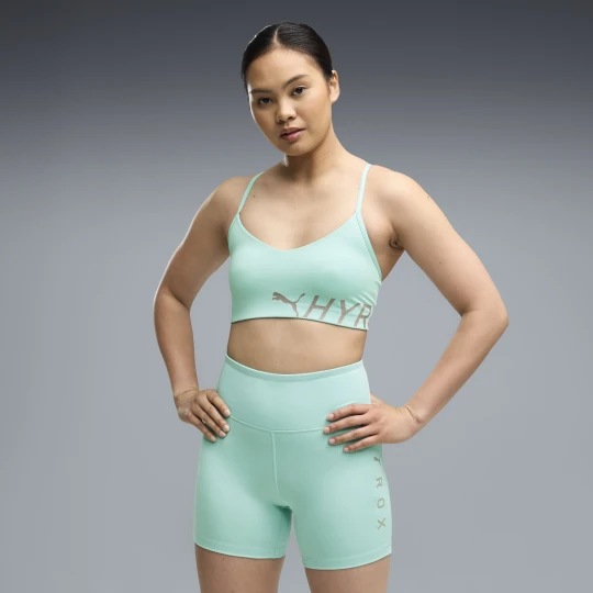 Zdjęcie produktu Damski stanik sportowy PUMA x HYROX Strappy PWRMODE, OdzieÅ¼, Zielony