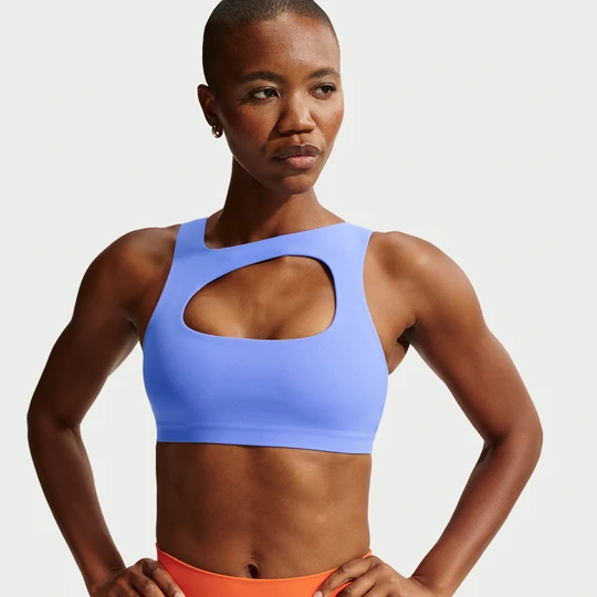 Zdjęcie produktu Damski stanik sportowy z lekką podszewką zapewniający lekkie wsparcie Nike Zenvy - Niebieski