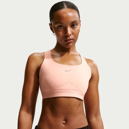Zdjęcie produktu Damski stanik sportowy z lekką podszewką zapewniający wysokie wsparcie Nike Swift - Pomarańczowy