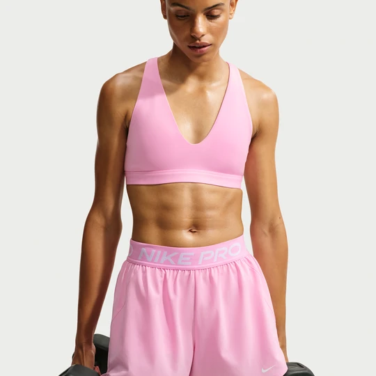 Zdjęcie produktu Damski stanik sportowy z lekkim wsparciem Nike Indy - Różowy