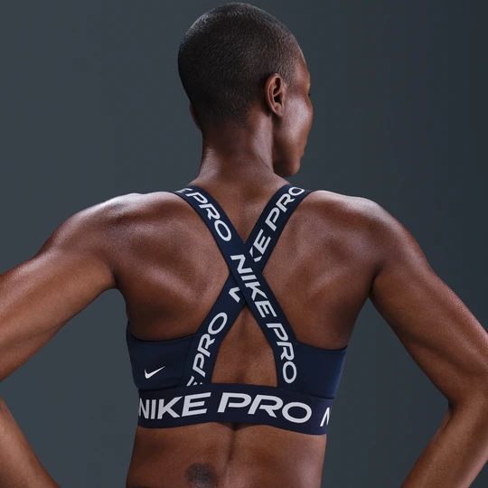 Zdjęcie produktu Damski stanik sportowy z miękkimi miseczkami i lekkim wsparciem Nike Pro - Niebieski