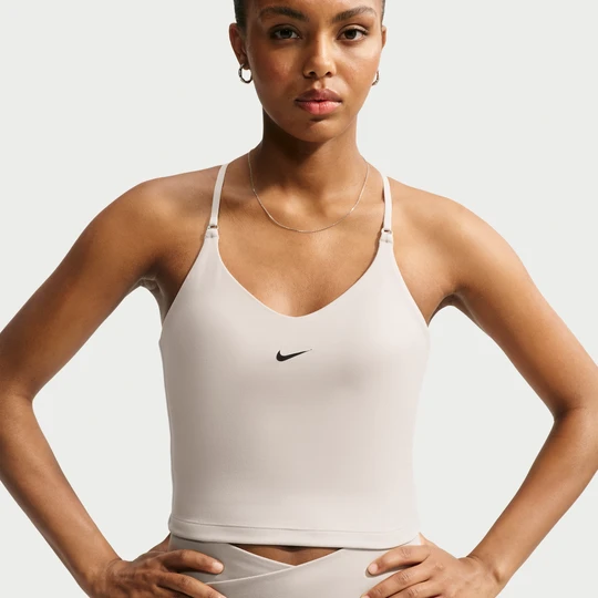 Zdjęcie produktu Damska koszulka bez rękawów ze stanikiem z regulacją i usztywnieniem zapewniającym lekkie wsparcie Nike Indy - Brązowy