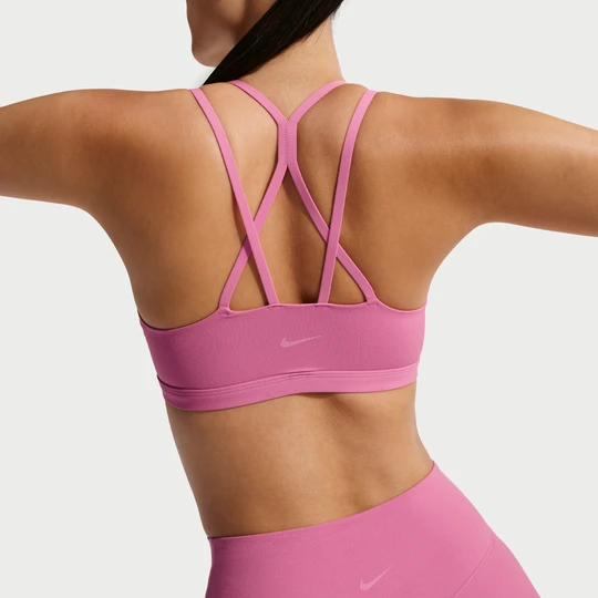 Zdjęcie produktu Damski stanik sportowy z wkładkami zapewniający lekkie wsparcie Nike Zenvy Strappy - Różowy
