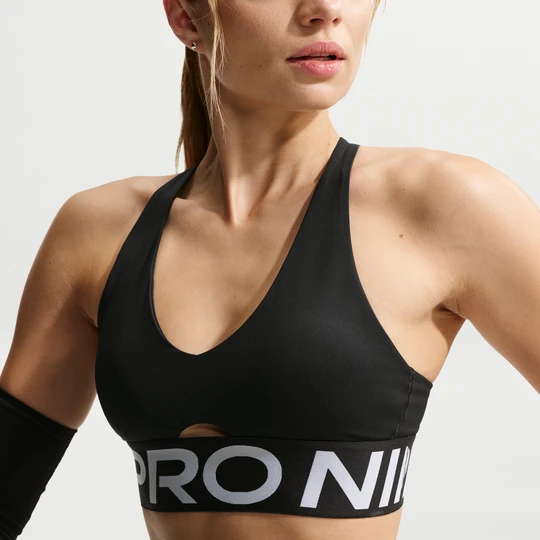 Zdjęcie produktu Damski stanik sportowy z wkładkami zapewniający średnie wsparcie Nike Pro Sculpt - Czerń