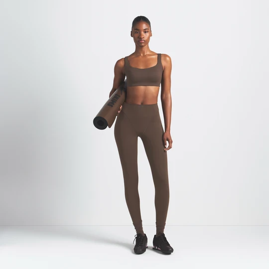 Zdjęcie produktu Damski stanik z dekoltem w kształcie litery U NikeSKIMS Matte - Brązowy