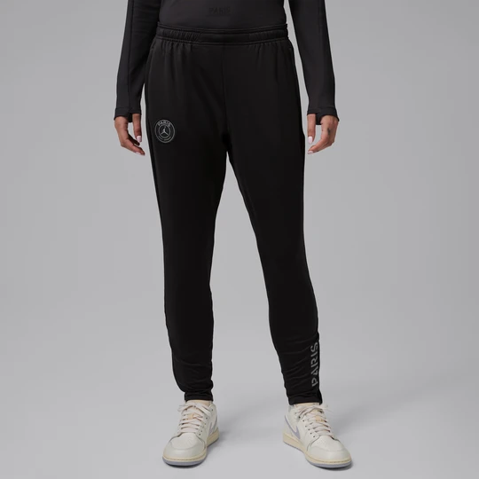 Zdjęcie produktu Damskie dzianinowe spodnie piłkarskie Jordan Dri-FIT Paris Saint-Germain Strike (wersja czwarta) - Czerń