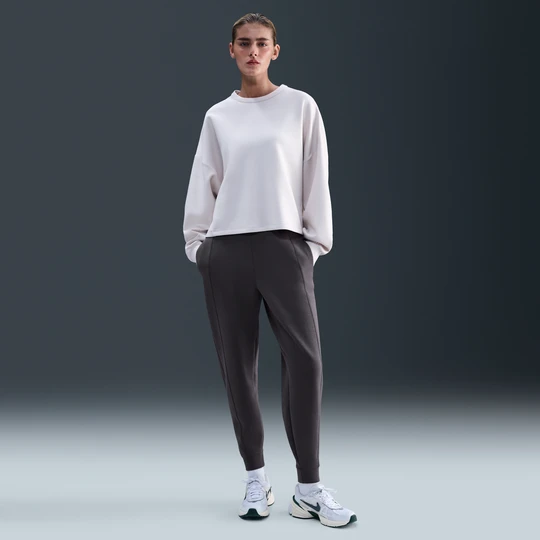 Zdjęcie produktu Damskie joggery ze średnim stanem Dri-FIT Nike 24.7 ImpossiblySoft - Szary
