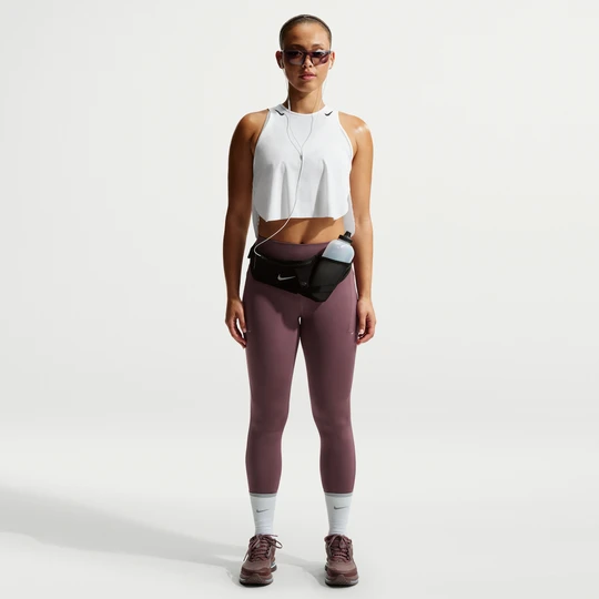 Zdjęcie produktu Damskie legginsy 7/8 do biegania z wysokim stanem i kieszeniami Nike Swift - Fiolet