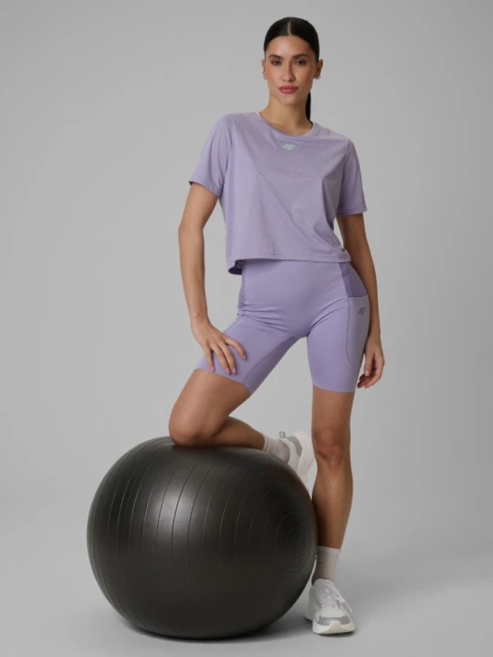 Zdjęcie produktu Damskie legginsy krótkie treningowe 4F 4FWSS26TFSTF071 - fioletowe