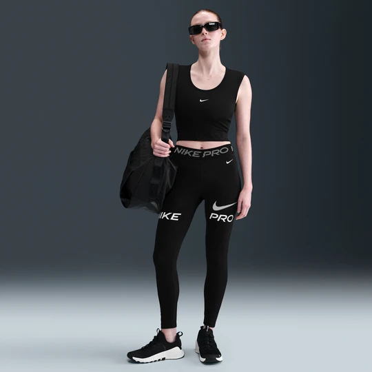 Zdjęcie produktu Damskie legginsy o długości 7/8 ze średnim stanem, wstawkami z siateczki i grafiką Nike Pro - Czerń