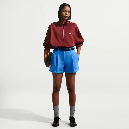 Zdjęcie produktu Damskie luźne spodenki ze średnim stanem Nike Pregame Fleece - Niebieski