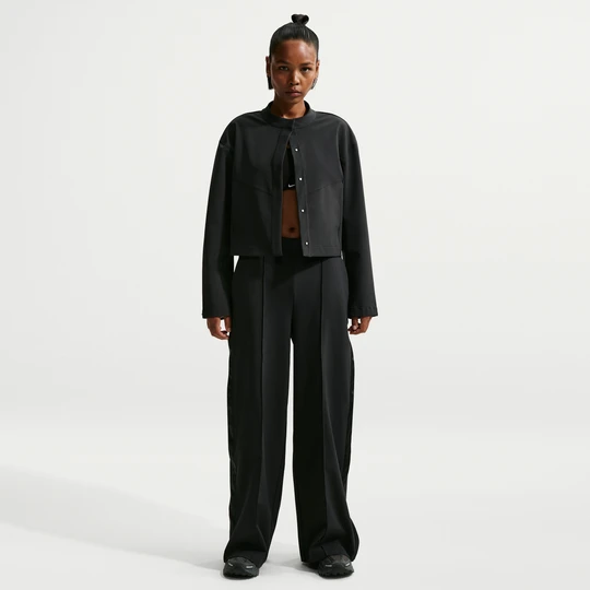 Zdjęcie produktu Damskie luźne spodnie z wysokim stanem i rozpinanymi nogawkami Dri-FIT Nike 24.7 PerfectStretch - Czerń