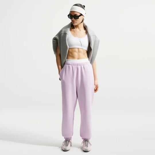 Zdjęcie produktu Damskie oversizowe spodnie z wysokim stanem i ściągaczami Nike Studio Fleece Medium Weight - Fiolet