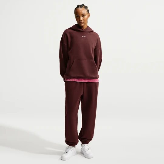 Zdjęcie produktu Damskie oversizowe spodnie z wysokim stanem i ściągaczami Nike Studio Fleece Medium Weight - Fiolet