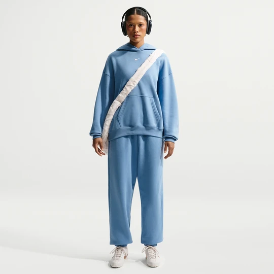 Zdjęcie produktu Damskie oversizowe spodnie z wysokim stanem i ściągaczami Nike Studio Fleece Medium Weight - Niebieski