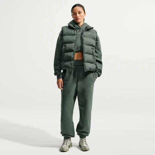 Zdjęcie produktu Damskie oversizowe spodnie z wysokim stanem i ściągaczami Nike Studio Fleece Medium Weight - Zieleń