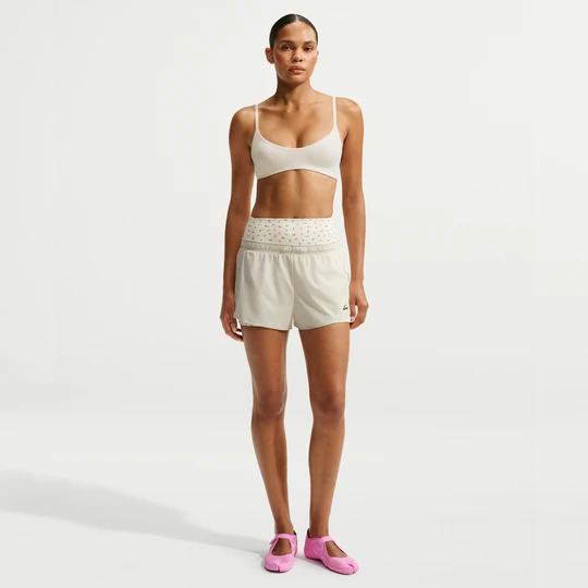 Zdjęcie produktu Damskie spodenki do biegania NikeSKIMS Stretch Nylon - Biel
