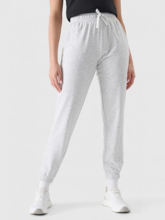 Zdjęcie produktu Damskie spodnie dresowe joggery 4F 4FWMM00TTROF1138 - szare
