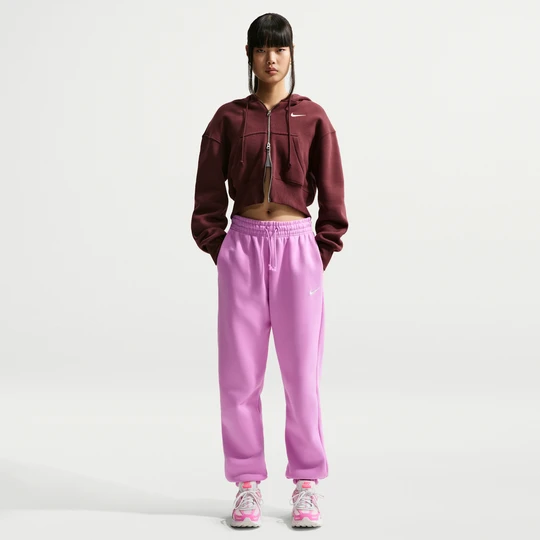 Zdjęcie produktu Damskie spodnie dresowe o kroju oversize z wysokim stanem Nike Phoenix Fleece - Fiolet