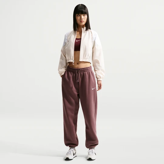 Zdjęcie produktu Damskie spodnie dresowe o kroju oversize z wysokim stanem Nike Phoenix Fleece - Fiolet
