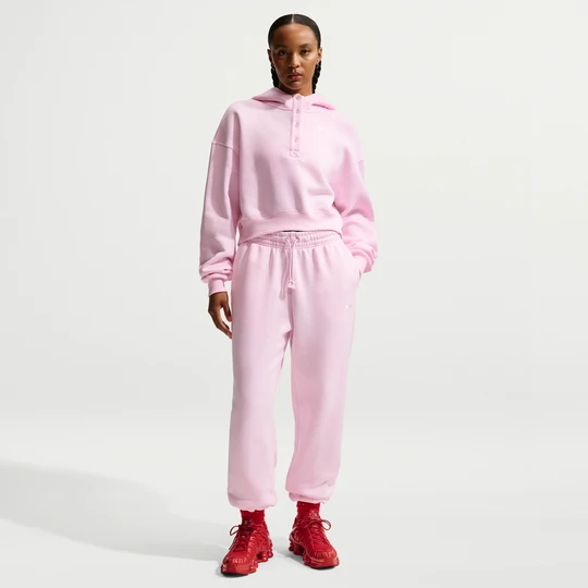 Zdjęcie produktu Damskie spodnie dresowe o kroju oversize z wysokim stanem Nike Phoenix Fleece - Różowy
