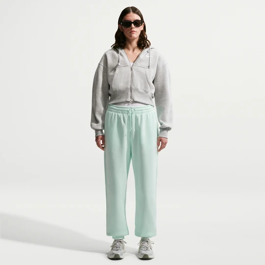 Zdjęcie produktu Damskie spodnie dresowe o kroju oversize z wysokim stanem Nike Phoenix Fleece - Zieleń