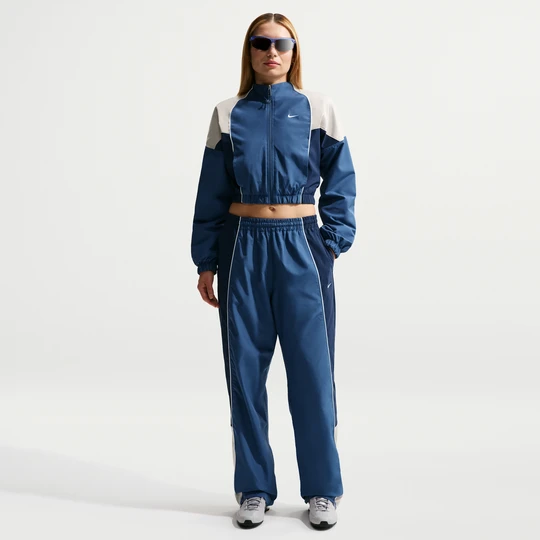 Zdjęcie produktu Damskie spodnie dresowe o kroju oversize ze średnim stanem Nike - Niebieski