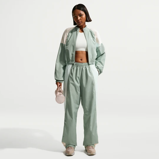 Zdjęcie produktu Damskie spodnie dresowe o kroju oversize ze średnim stanem Nike - Zieleń