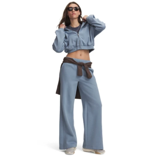 Zdjęcie produktu Damskie spodnie dresowe Under Armour Icon Fleece Sama Wide Leg - niebieskie
