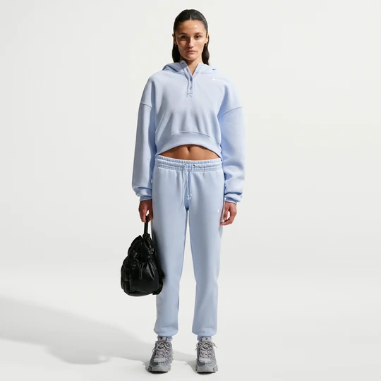 Zdjęcie produktu Damskie spodnie dresowe ze średnim stanem Nike Phoenix Fleece - Niebieski