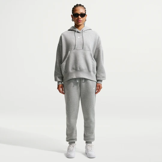 Zdjęcie produktu Damskie spodnie dresowe ze średnim stanem Nike Phoenix Fleece - Szary
