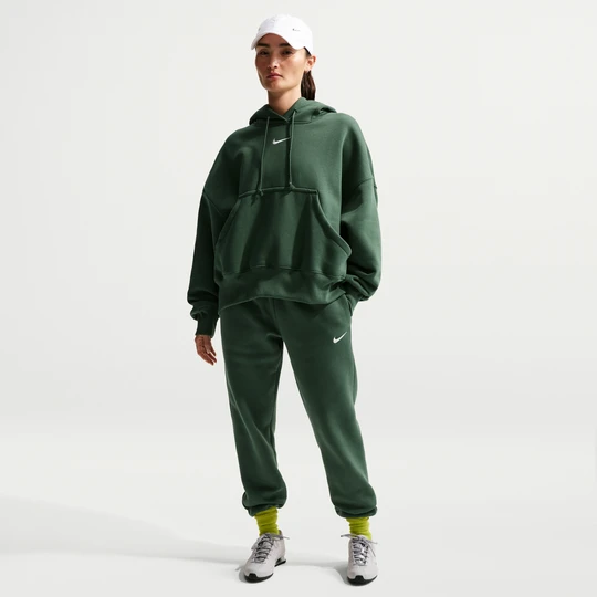 Zdjęcie produktu Damskie spodnie dresowe ze średnim stanem Nike Phoenix Fleece - Zieleń