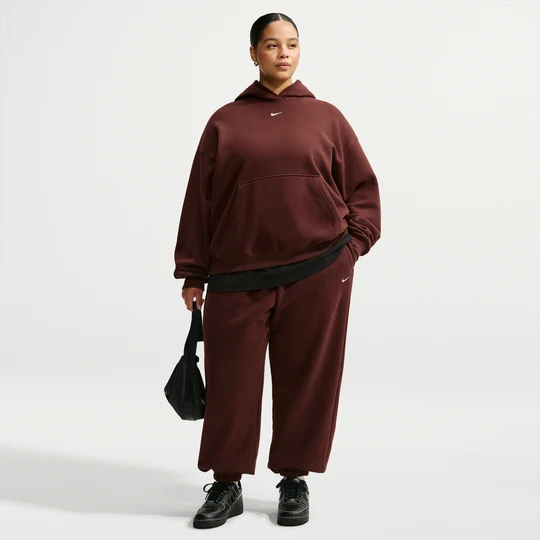 Zdjęcie produktu Damskie spodnie o kroju oversize z wysokim stanem i ściągaczami Nike Studio Fleece Medium Weight (duże rozmiary) - Fiolet