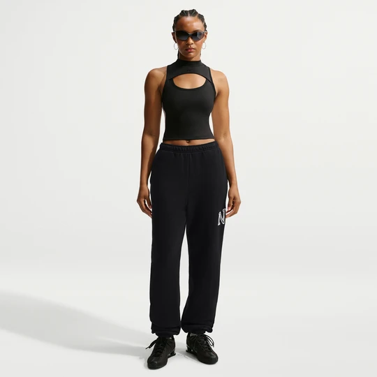 Zdjęcie produktu Damskie spodnie o kroju oversize ze ściągaczami i logo Nike Studio Fleece Medium Weight „Graphic Pack” - Czerń