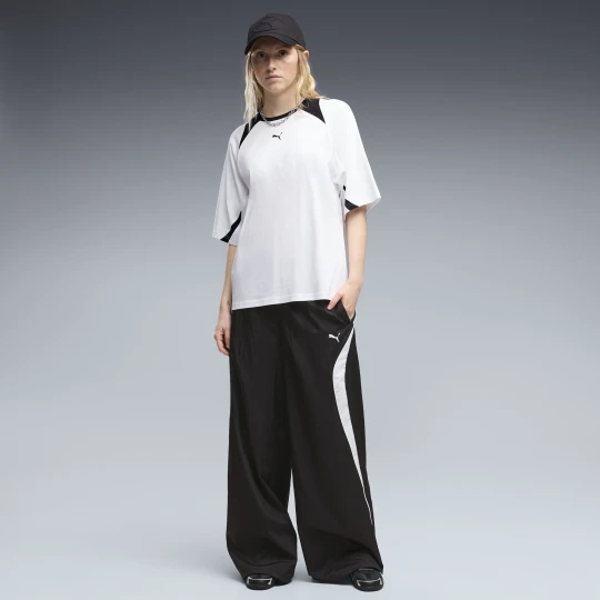 Zdjęcie produktu Damskie spodnie o luźnym kroju z tkaniny PUMA Sport, Odzież, Czarny