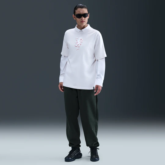 Zdjęcie produktu Damskie spodnie piłkarskie o kroju oversize z wysokim stanem Nike Chelsea F.C. Phoenix Fleece - Zieleń