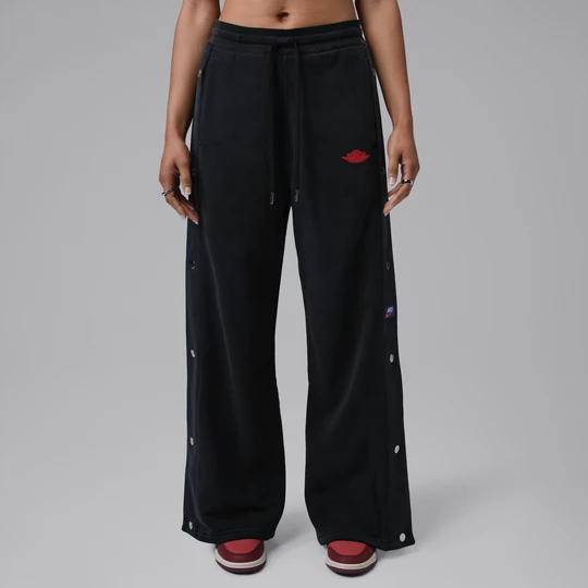 Zdjęcie produktu Damskie spodnie z dzianiny dresowej na zatrzaski Jordan Flight Fleece - Czerń